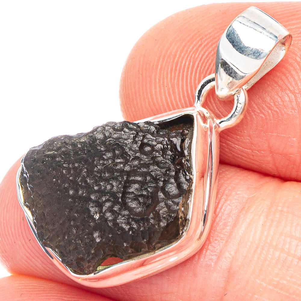 925 sterling silver Moldavite pendant with silver bail and rough dark stone