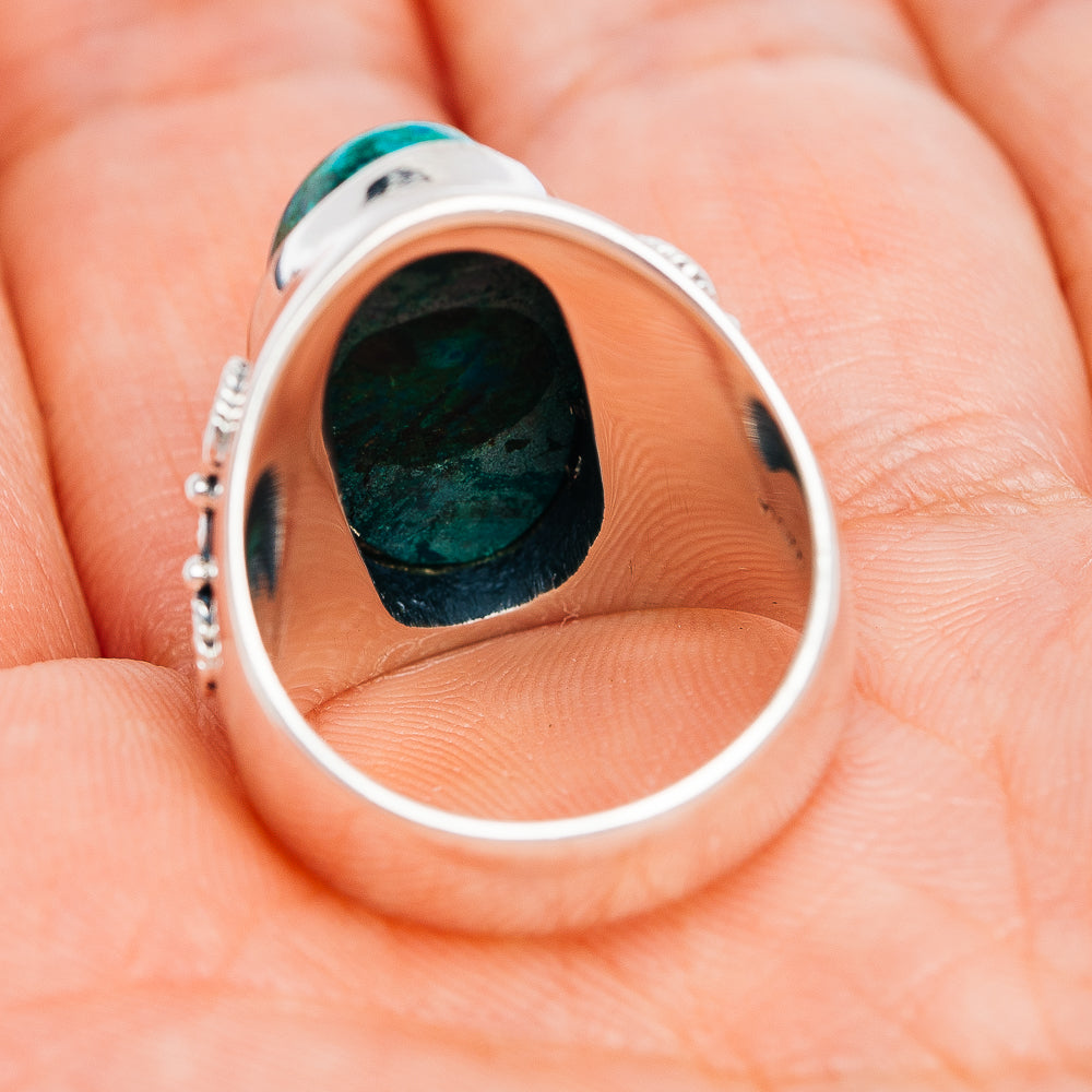 Sterling silver ring showing open band and oval chrysocolla cabochon setting