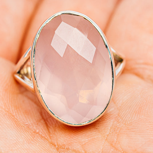 Oval faceted rose quartz ring in .925 sterling silver with slim band, side view
