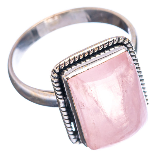 Silver band rose quartz ring with square pink stone and braided frame detail