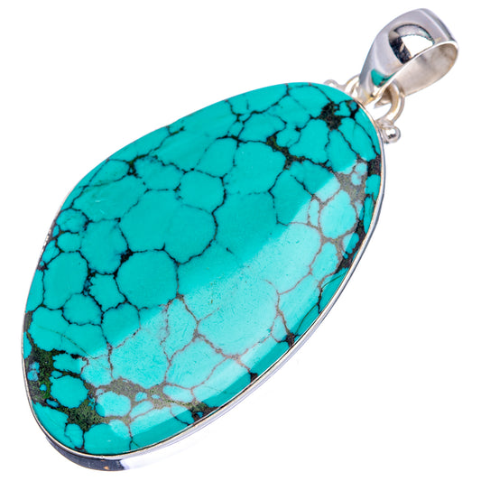Turquoise oval pendant with vein-like crackle pattern and round sterling silver bail