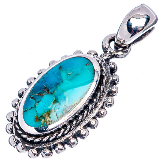Turquoise oval pendant with ornate .925 sterling silver bezel and bail.