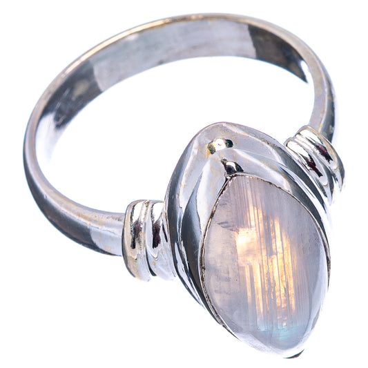 Oval moonstone cocktail ring, iridescent gray-white stone on hinged silver band