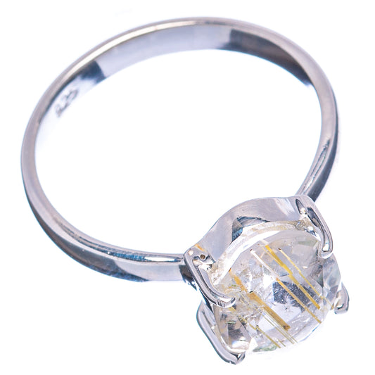 Sterling silver ring featuring a clear oval rutilated quartz with raised side prongs