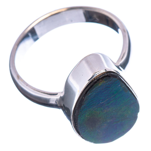 Sterling silver ring with oval iridescent ammolite cabochon, blue-green