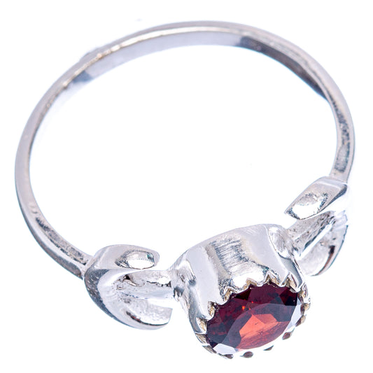 Sterling silver dainty ring with red round gemstone and split band, side angle