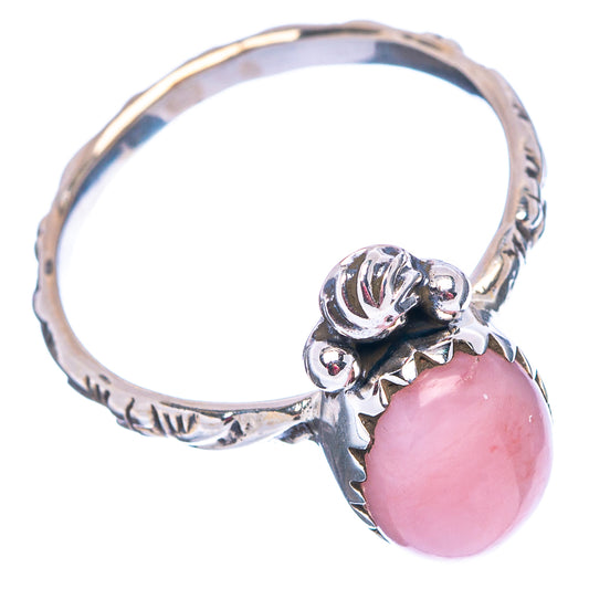 Sterling silver ring with pink oval opal and carved leaflike band detail, side view