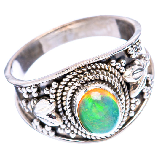 Sterling silver opal ring, openwork scroll engraving around oval green opal stone