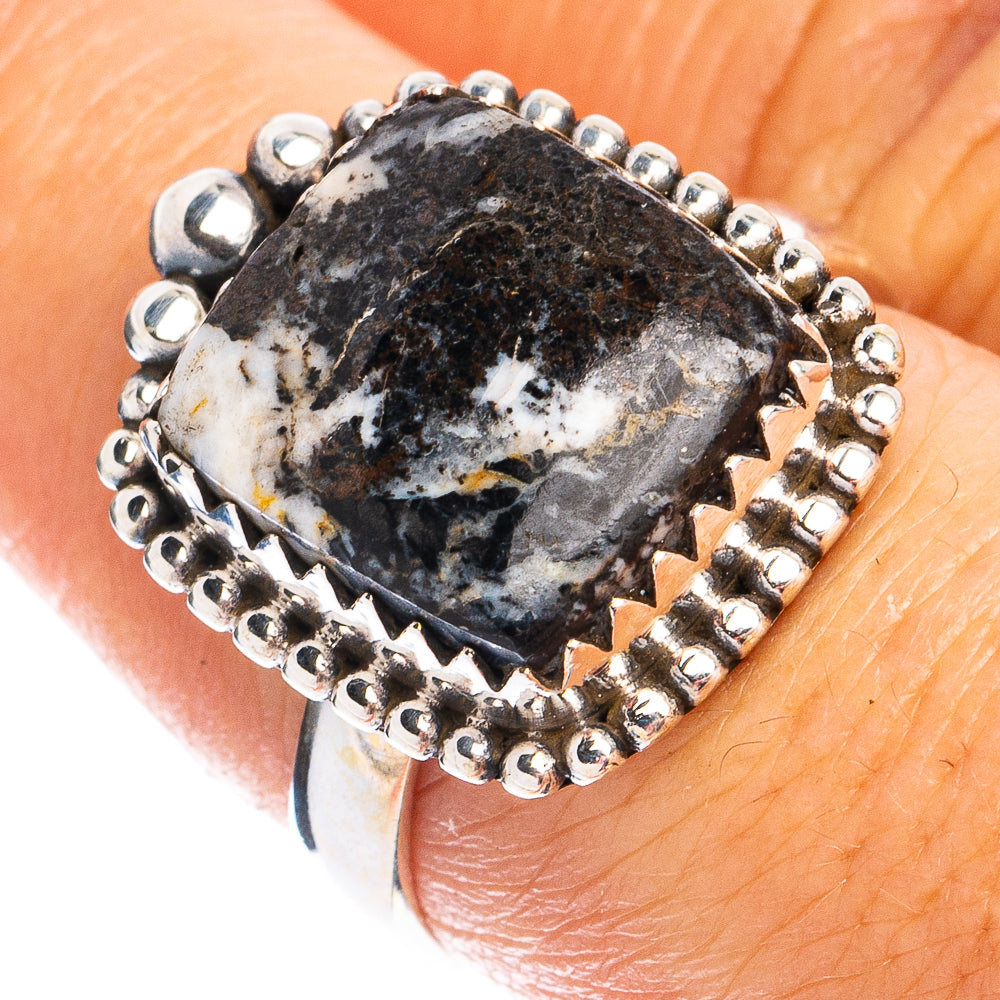 Sterling silver oval turquoise ring with dark speckled centerpiece