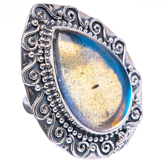 Oval labradorite ring in .925 sterling silver with filigree border and blue-gold flash