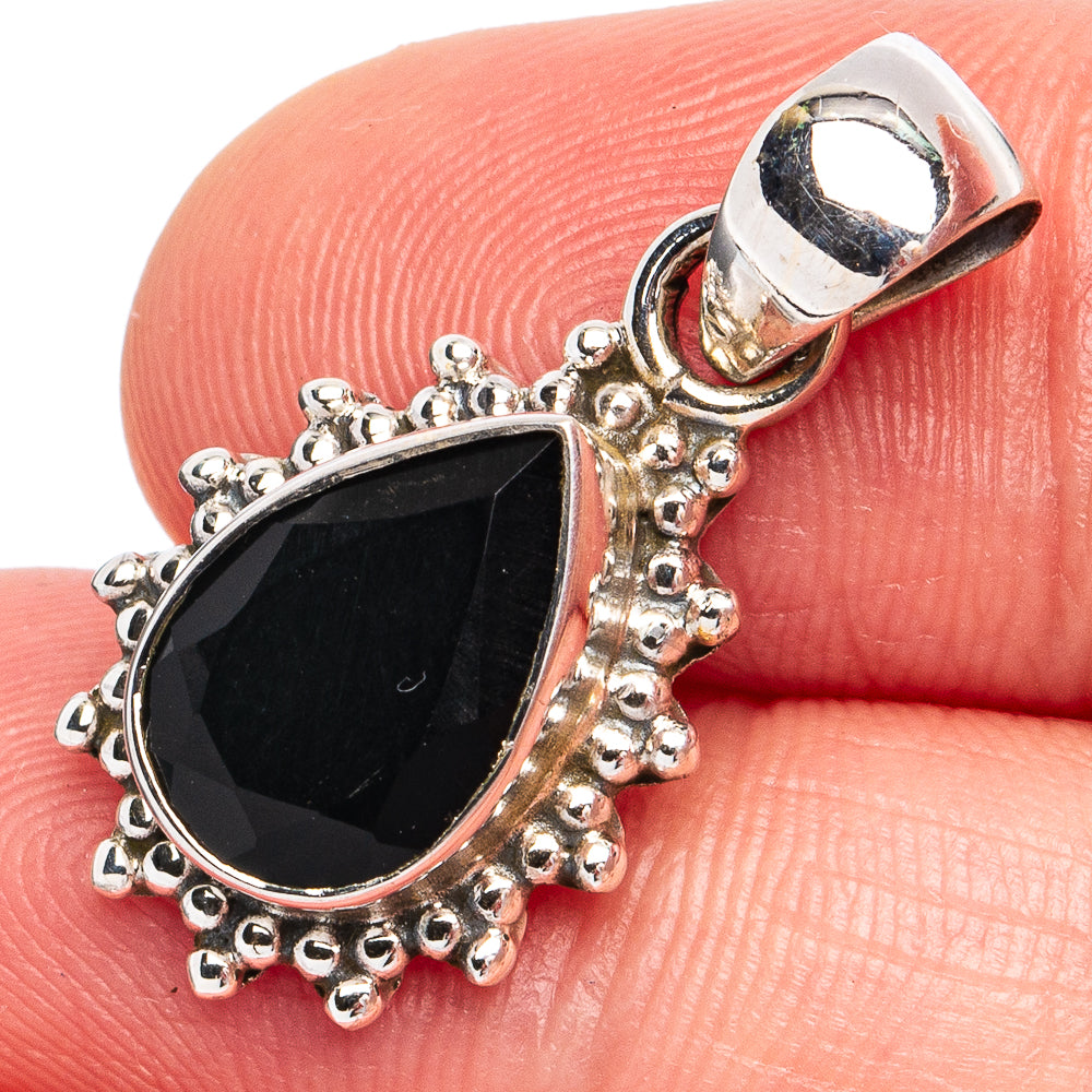 Sterling silver teardrop onyx pendant with ornate beaded bezel and loop bail