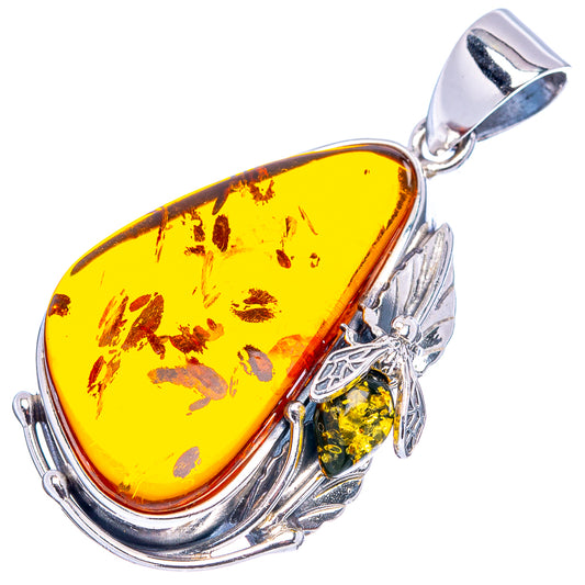 Teardrop yellow amber pendant with bee motif on .925 sterling silver setting and bail