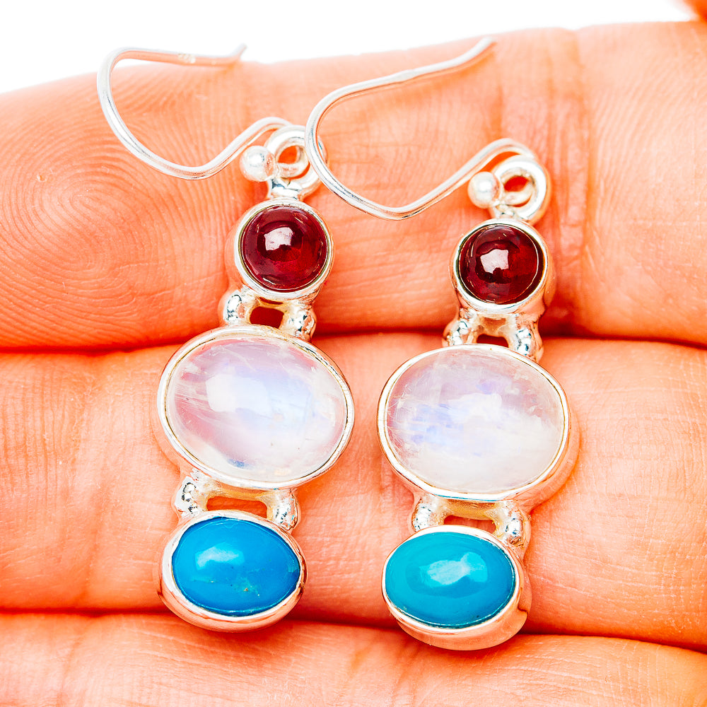Sterling silver drop earrings with red gemstone, moonstone-style oval and blue accents