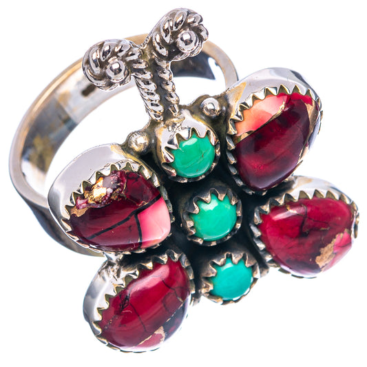 Sterling silver ring with green turquoise stones and red oval cabochons in ornate bezel