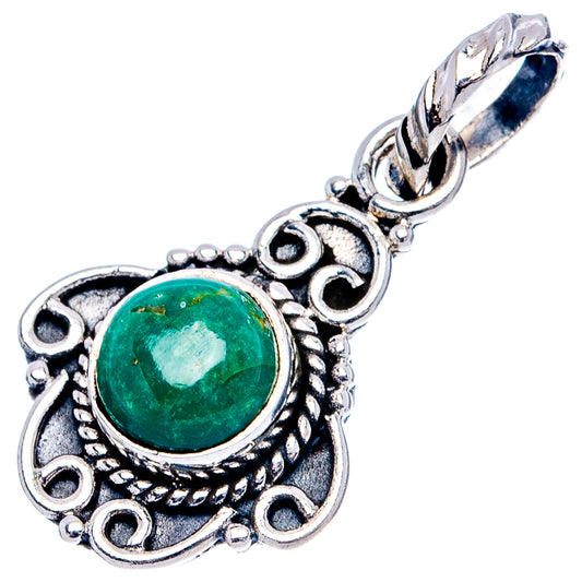 Sterling silver pendant with green cabochon in decorative circular setting and bail