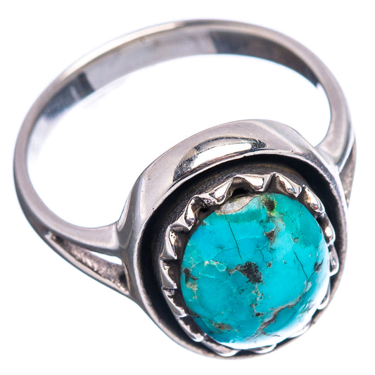 Sterling silver ring band with circular turquoise cabochon and carved bezel detail