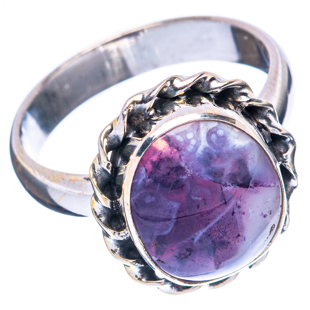 Sterling silver ring with oval purple opal and sculpted side details