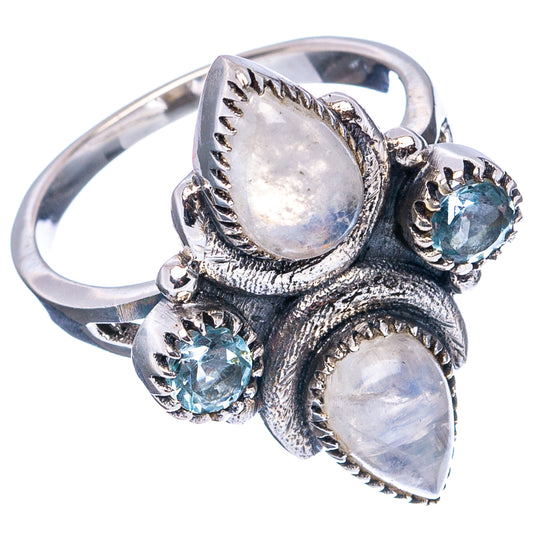 Sterling silver statement ring with two round blue topaz stones and two pear-shaped moonstones