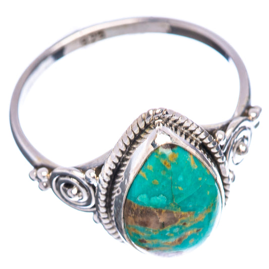 Turquoise teardrop sterling silver ring, side view with rope edge and swirl details