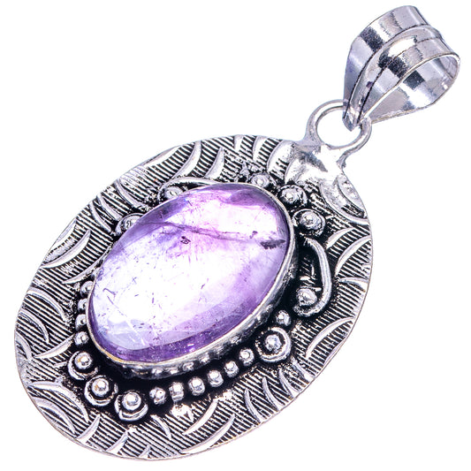 German-silver amethyst pendant with oval purple stone, bead trim, and textured leaf frame