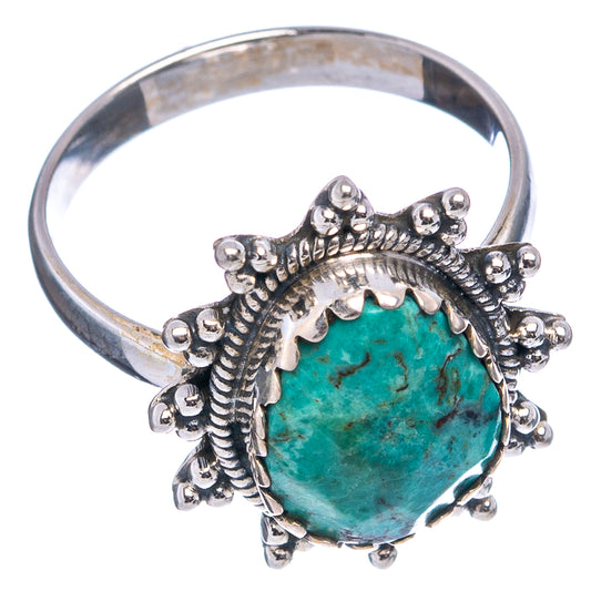 Turquoise gemstone ring in sterling silver with raised round bezel and crown details