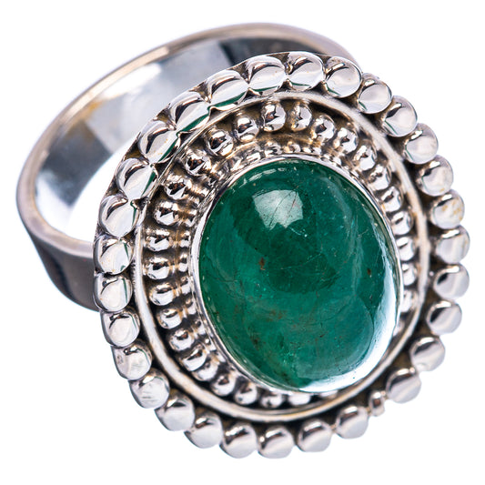 Sterling silver ring with oval green emerald centerpiece and round halo