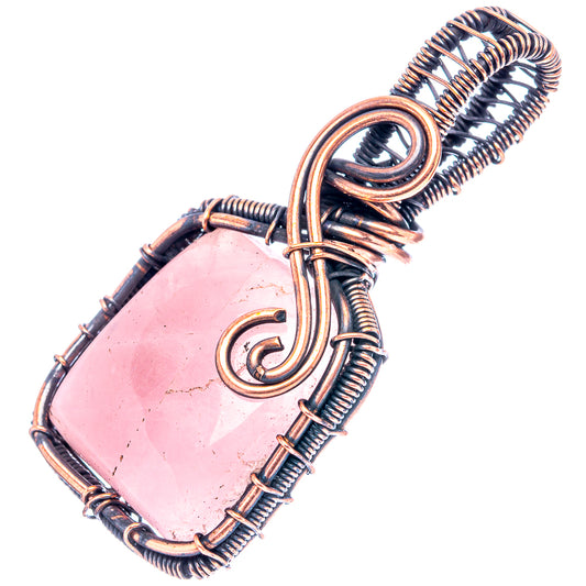 Rose quartz wire-wrapped pendant, pink stone with oxidized copper coiled wire borders