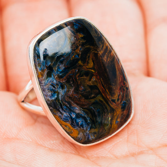 Sterling silver ring with oval pietersite cabochon, blue highlights over dark brown