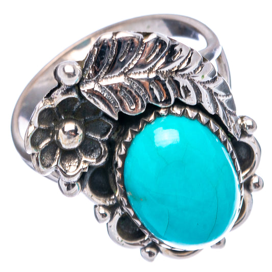 Turquoise oval sterling silver ring, side view with floral and leaf detailing, size 8.