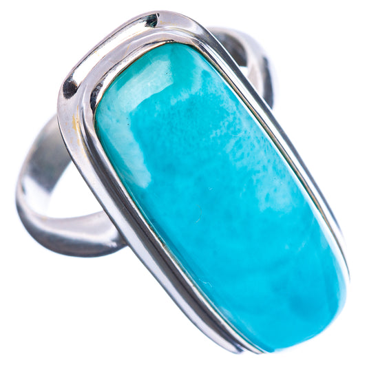 Sterling silver Larimar oval ring, turquoise-blue cabochon stone in bezel, angled