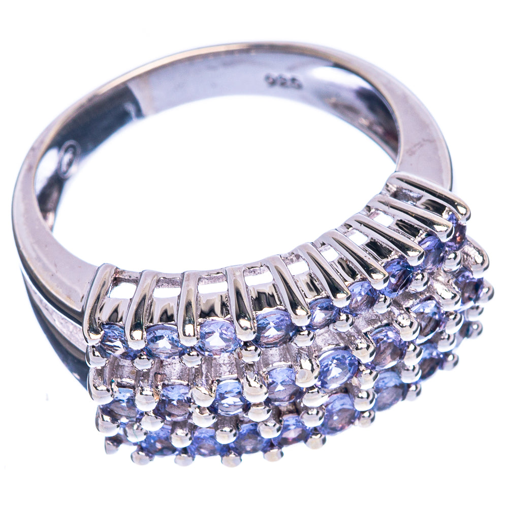 Sterling silver tanzanite ring with purple stone cluster across the band, side view