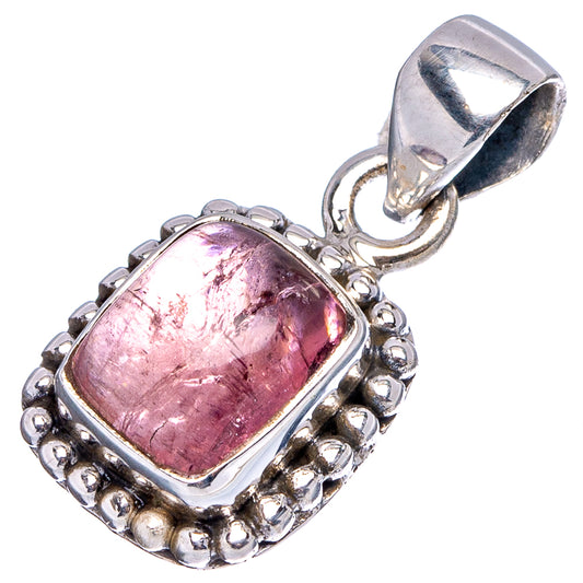 Sterling silver pink tourmaline pendant with raised bezel, rope edge, and loop bail