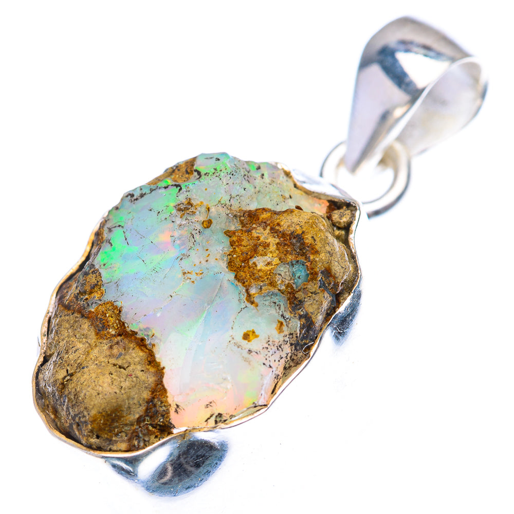 Raw opal pendant with green-blue opal patch and sterling silver bail