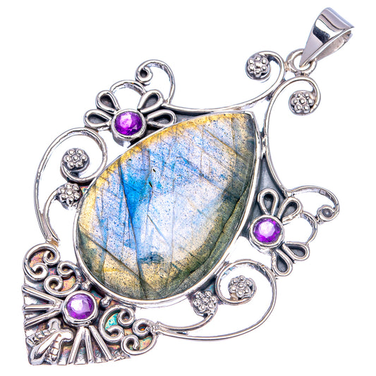 Sterling silver labradorite pendant with blue-green flash stone, purple cabochons, and bale