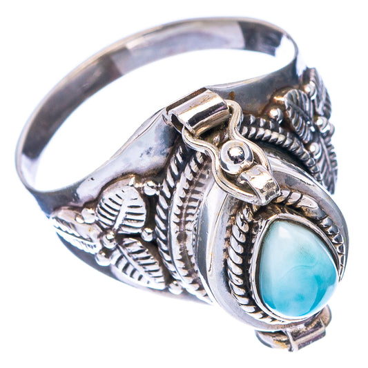 Sterling silver ring with oval larimar cabochon and engraved leaf-style setting