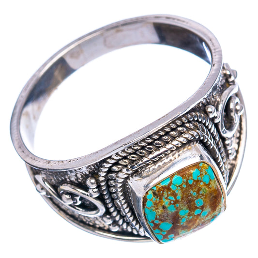 Turquoise cabochon sterling silver signet-style ring with detailed side engraving