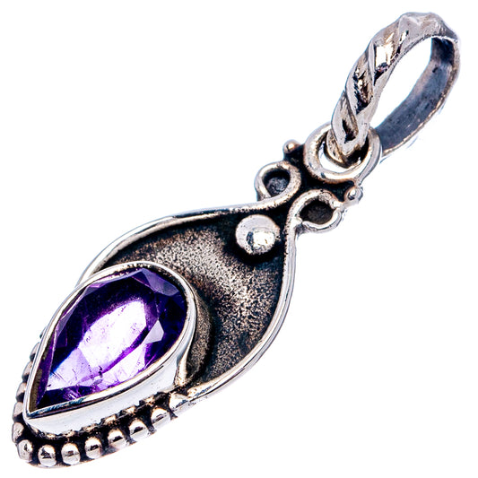 Sterling silver amethyst pendant with oval purple gemstone and ornate teardrop frame