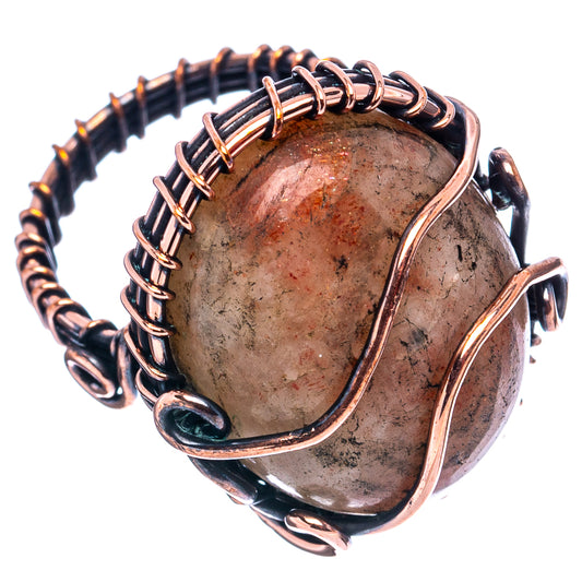 Oxidized copper wire wrap ring with oval druzy stone and dark braided accents