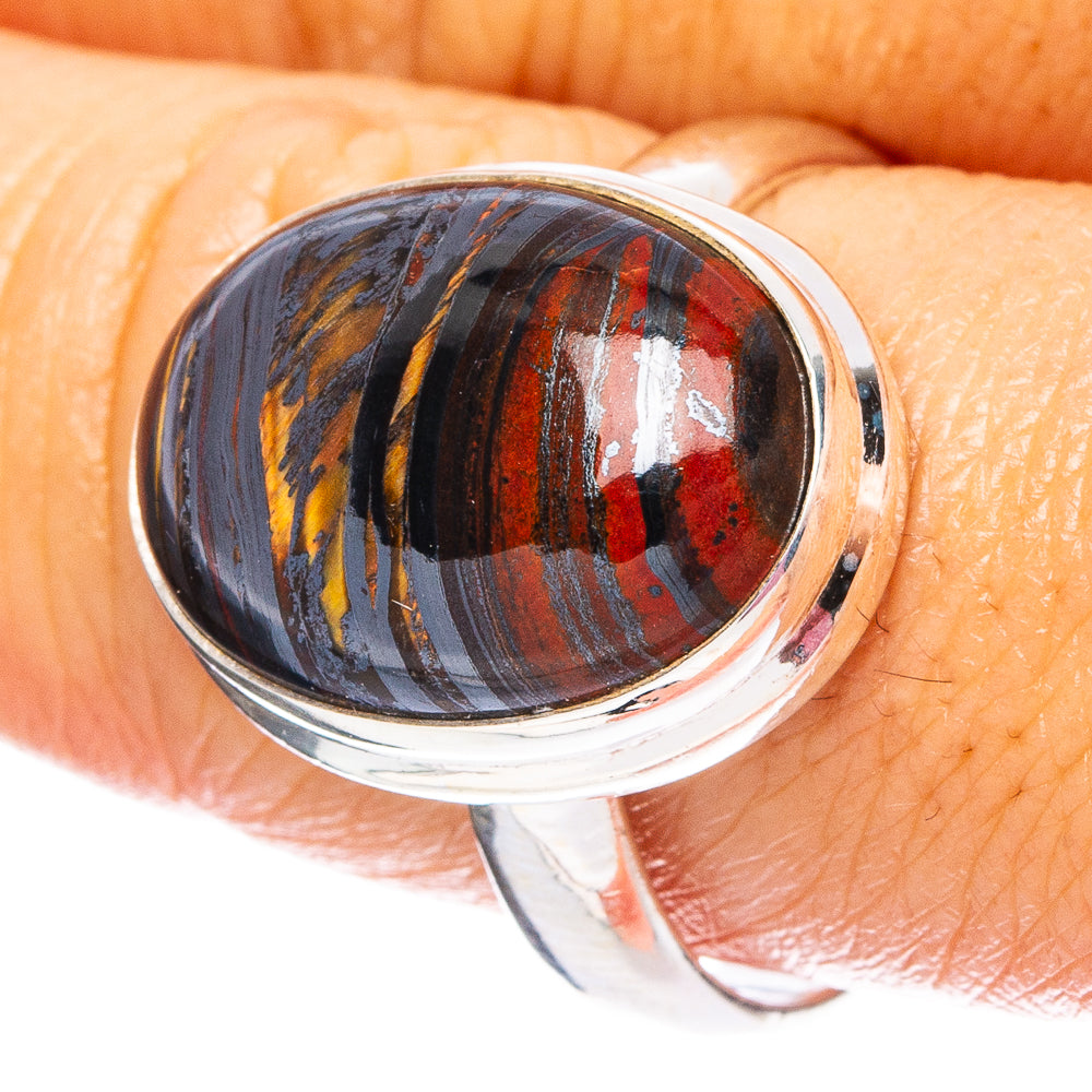 Sterling silver ring with tiger iron oval cabochon, dark blue and red pattern
