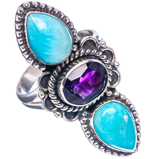 Sterling silver ring featuring two oval blue cabochons and a round purple center stone