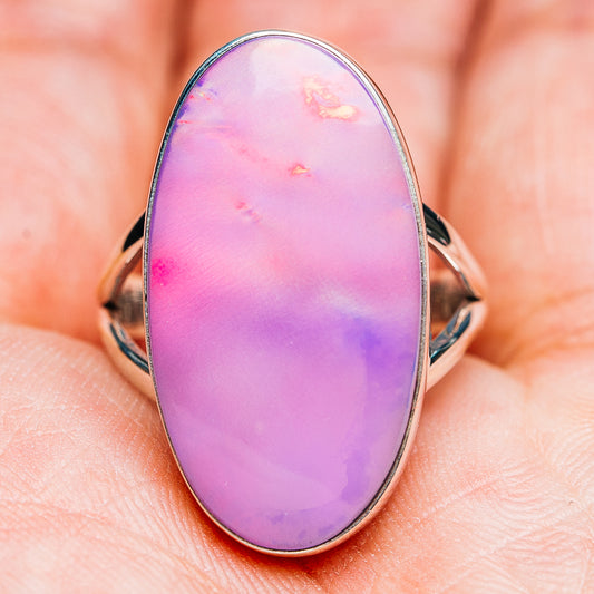 Oval pink-purple opal ring, sterling silver band with curved open sides