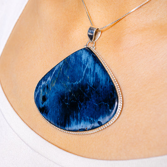 Blue pietersite teardrop pendant with sterling silver bail and bezel setting