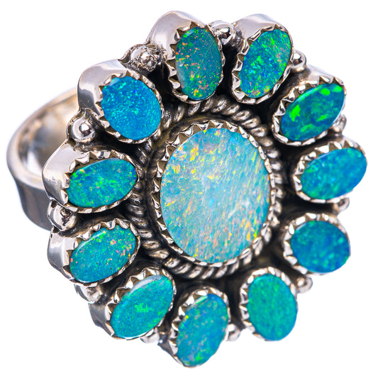 Sterling silver opal doublet ring with large round center oval and blue-green bezel stones