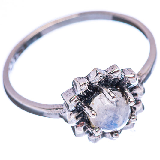 Sterling silver moonstone ring view with round opalescent gem and scalloped side prongs