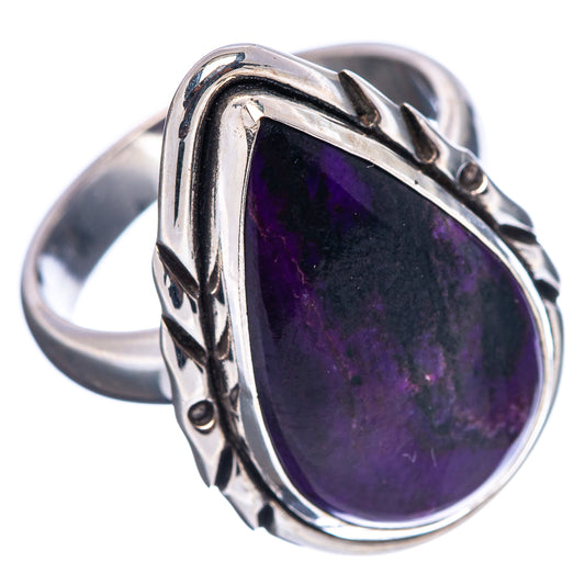 Sterling silver sugilite ring with raised purple teardrop stone and carved side details