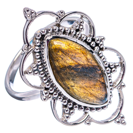 Sterling silver labradorite ring with yellow-gold marquise stone and ornate bezel setting