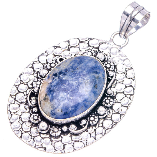 German silver textured oval sodalite pendant with blue cabochon and metal loop bail