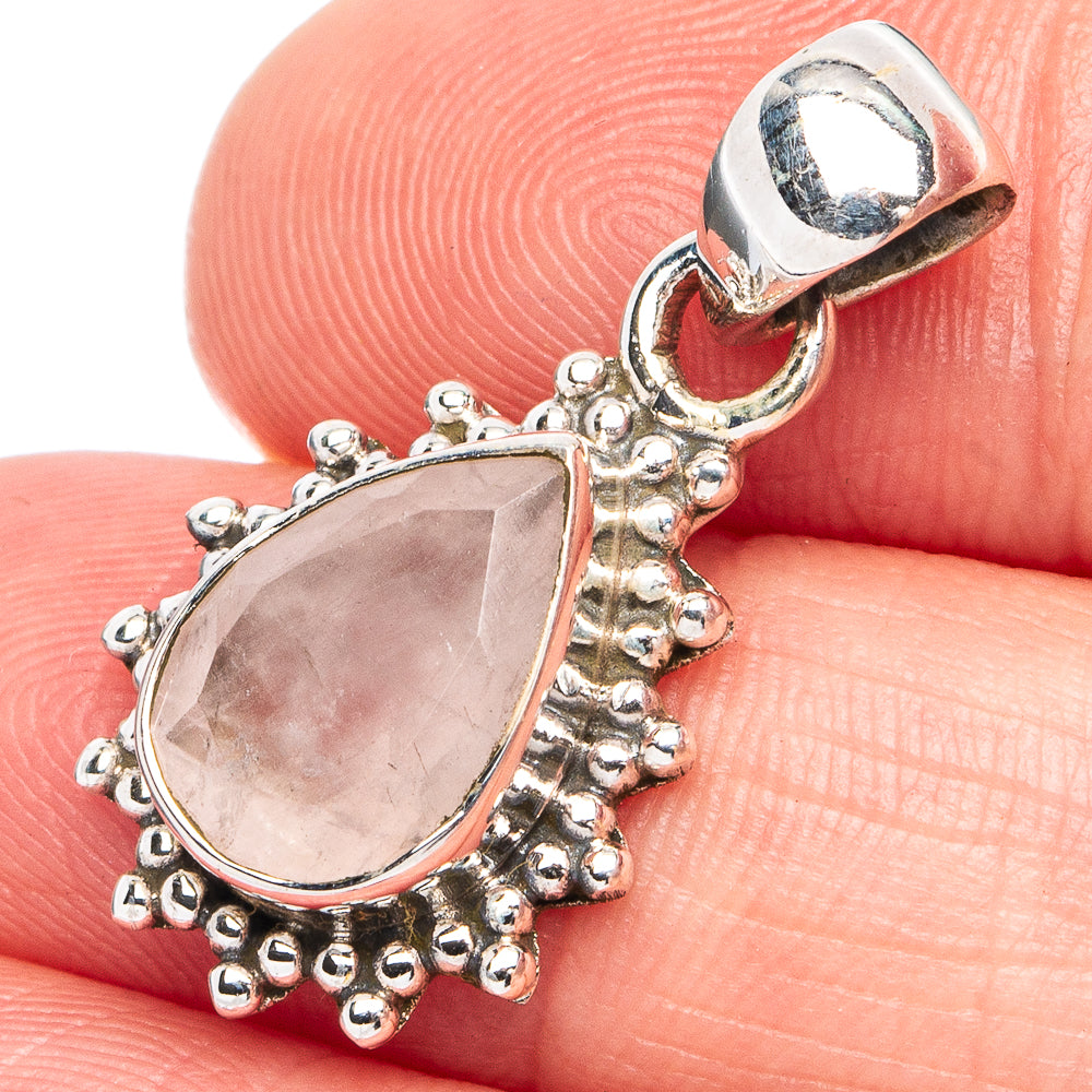 Sterling silver rose quartz teardrop pendant with ornate bead frame and bail