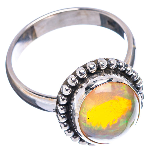 Opal cabochon ring with beaded bezel and polished .925 sterling silver band