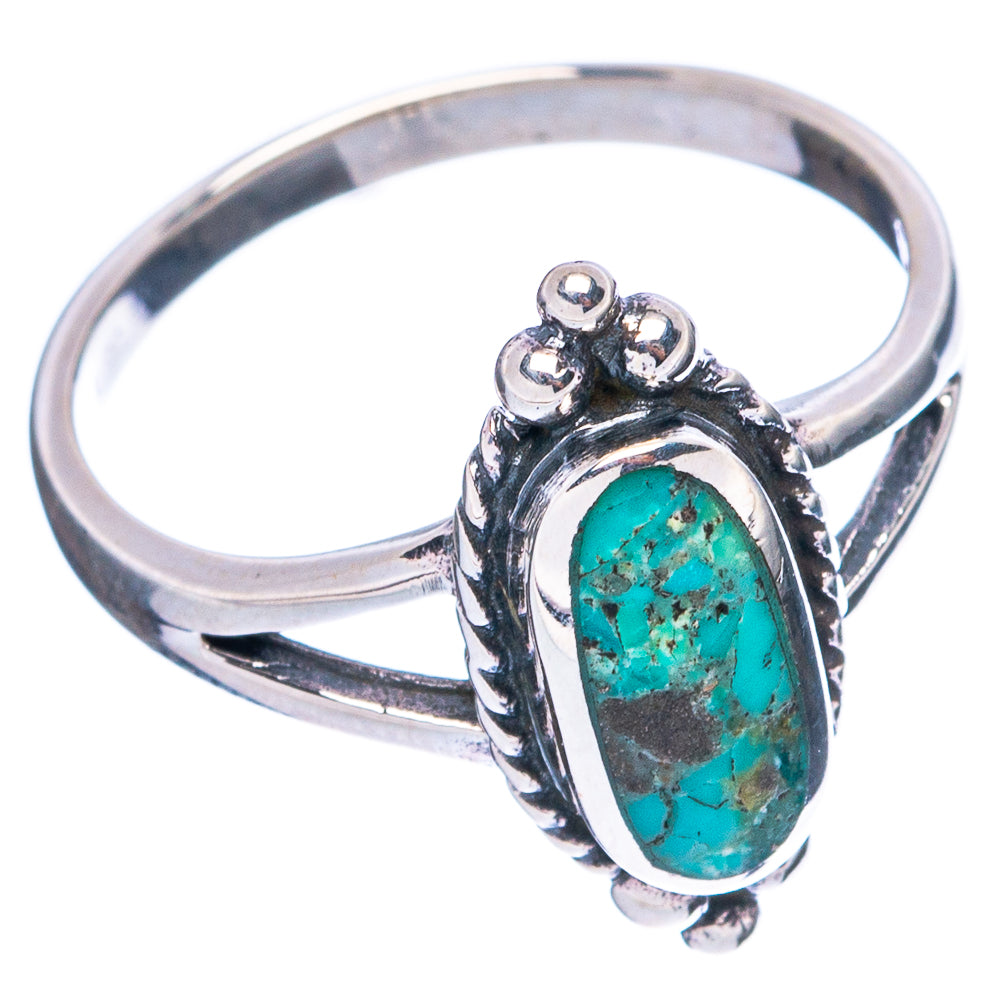 Sterling silver ring with oval turquoise cabochon, arched top and raised setting